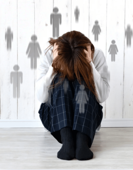 A woman experiencing trauma and emotional distress needs trauma therapy support